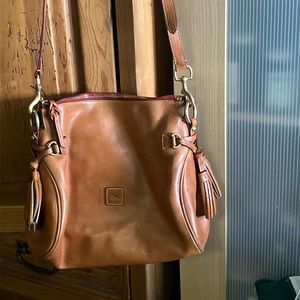 Dooney and Bourke leather tan bag. Great condition$180 OBO